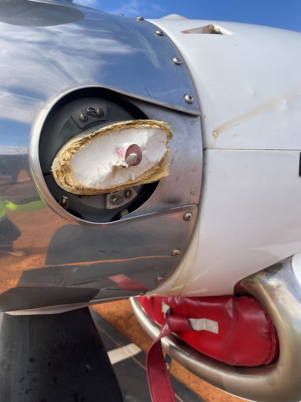 Propeller strike due to foreign object debris involving Beech 1900D